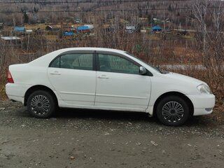 2001 Toyota Corolla IX (E120, E130), белый, 530000 рублей, вид 2