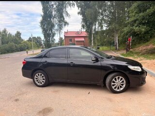 2012 Toyota Corolla X (E140, E150) Рестайлинг, чёрный, 920000 рублей, вид 3