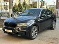 2015 BMW X6 50i II (F16), чёрный, 2100000 рублей - вид 1