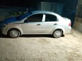 2011 Chevrolet Aveo I Рестайлинг, серебристый, 560000 рублей - вид 6