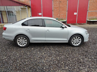 2014 Volkswagen Jetta VI Рестайлинг, серебристый, 890000 рублей, вид 2