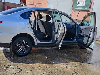 2014 Nissan Almera III (G15), серебристый, 650000 рублей, вид 4