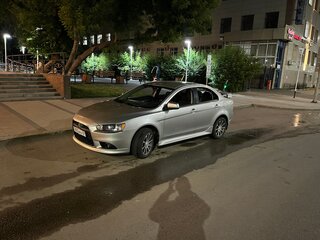 2014 Mitsubishi Lancer X Рестайлинг, серебристый, 950000 рублей, вид 1