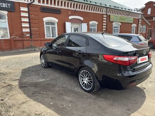 2012 Kia Rio 5-speed III, чёрный, 835000 рублей, вид 5
