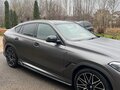 2021 BMW X6 40i III (G06), серый, 7850000 рублей - вид 1