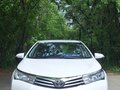 2013 Toyota Corolla XI (E160, E170, E180), белый, 1530000 рублей - вид 2