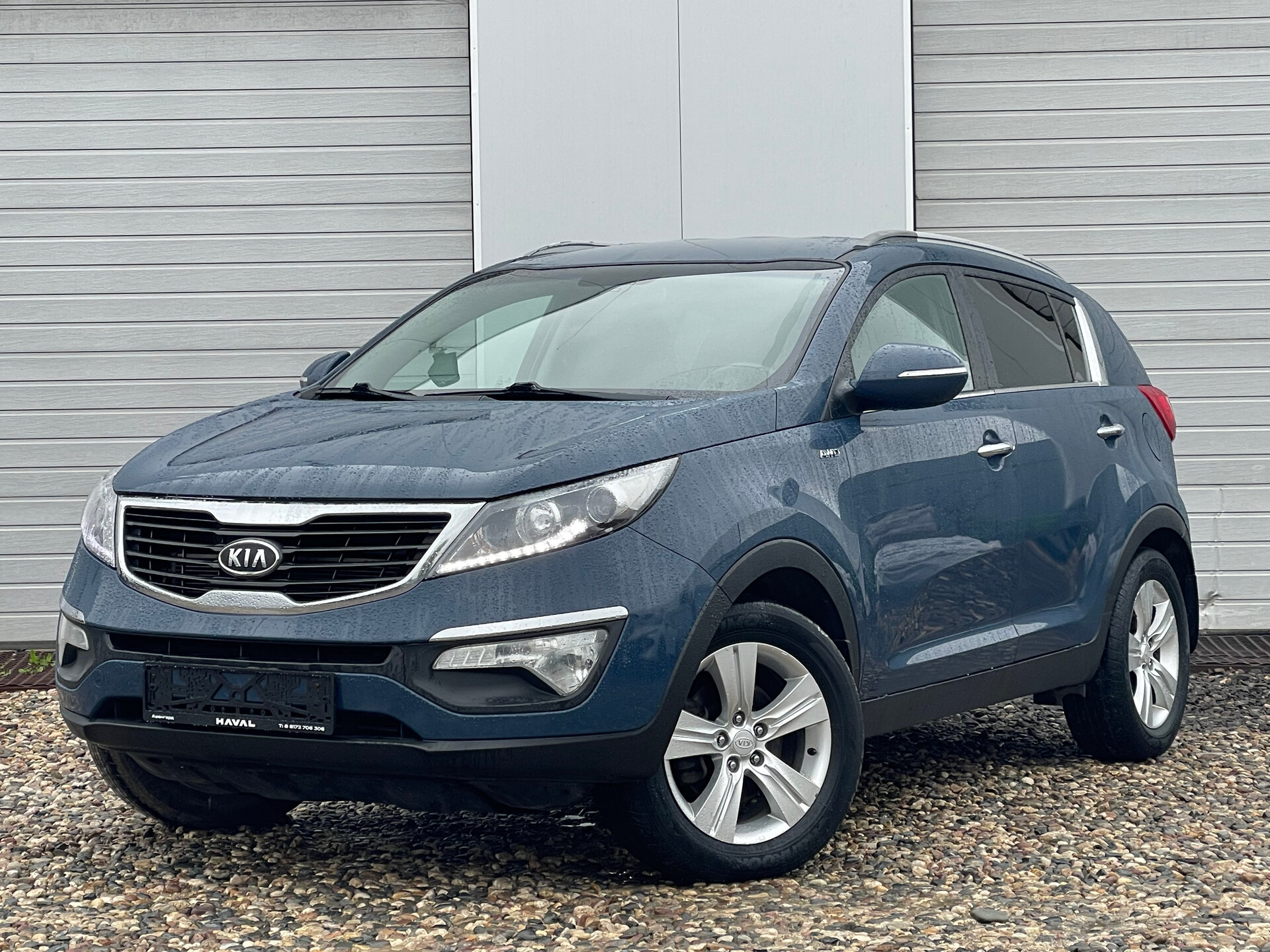 Kia Sportage, III 2.0 AT (150 л.с.) 4WD 2012