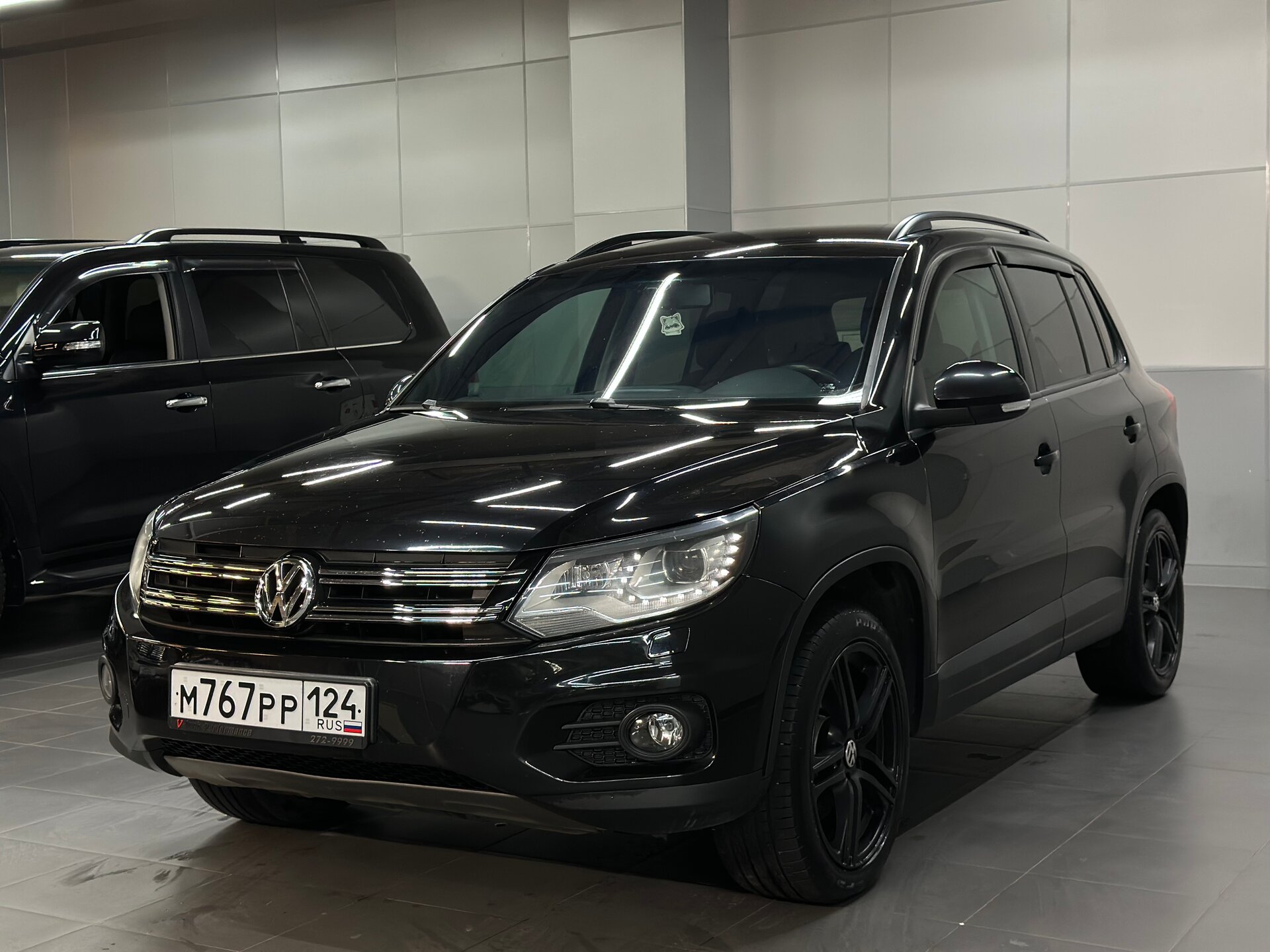 Volkswagen Tiguan — фото 1