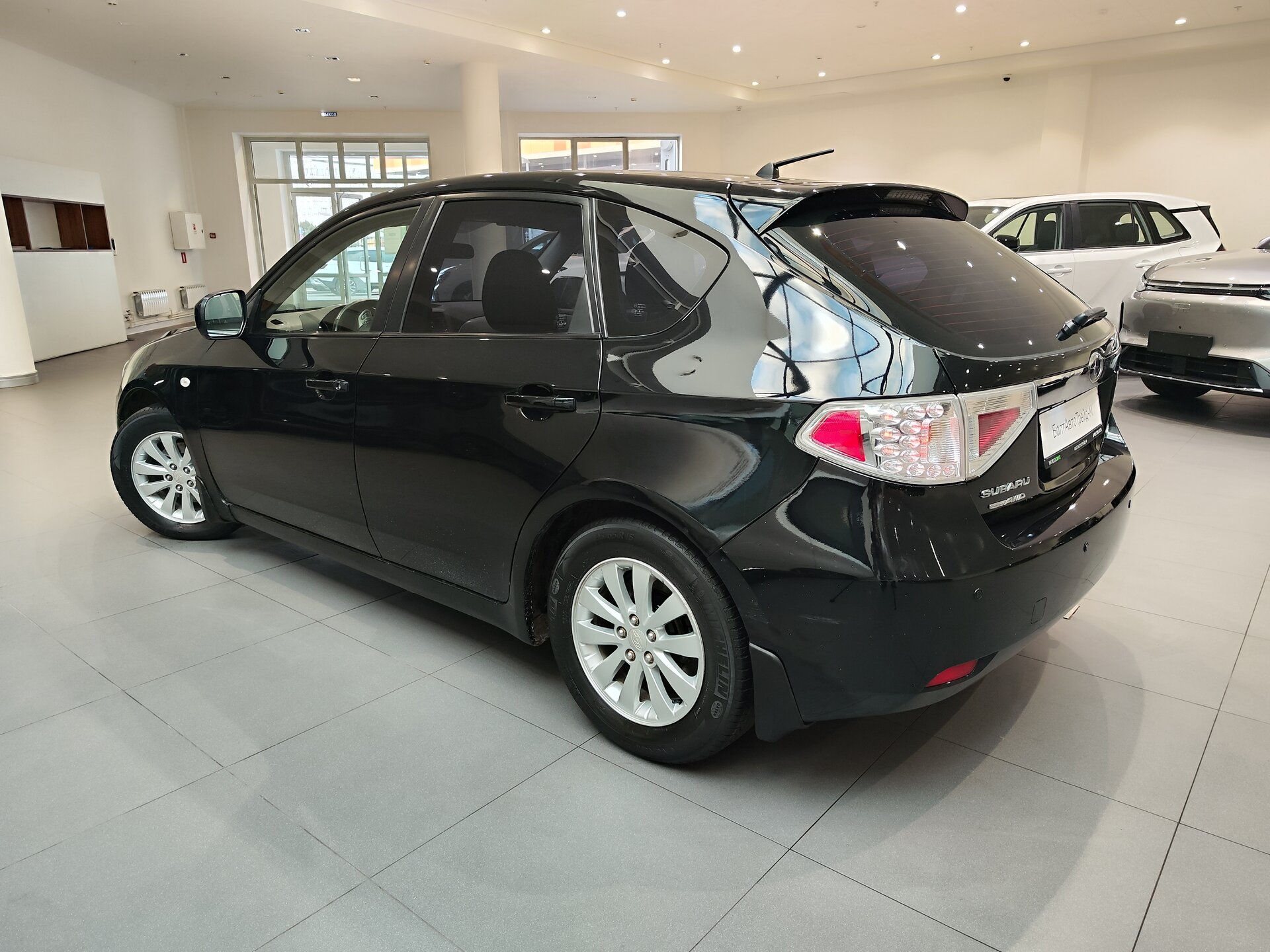 Автомобиль Subaru Impreza 1.5 AT (107 л.с.) 4WD - 4
