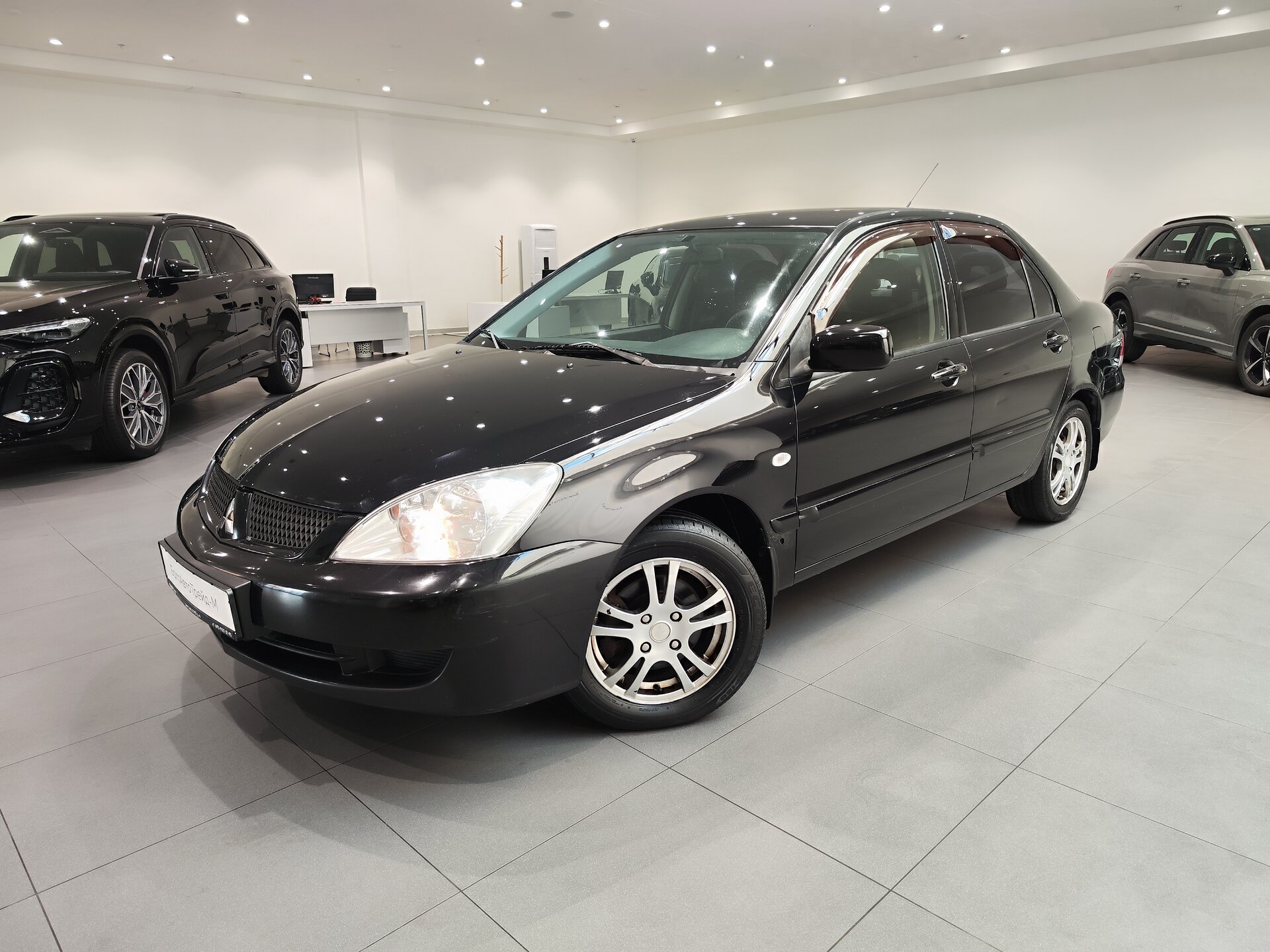 Автомобиль Mitsubishi Lancer 1.6 MT (98 л.с.) - 1