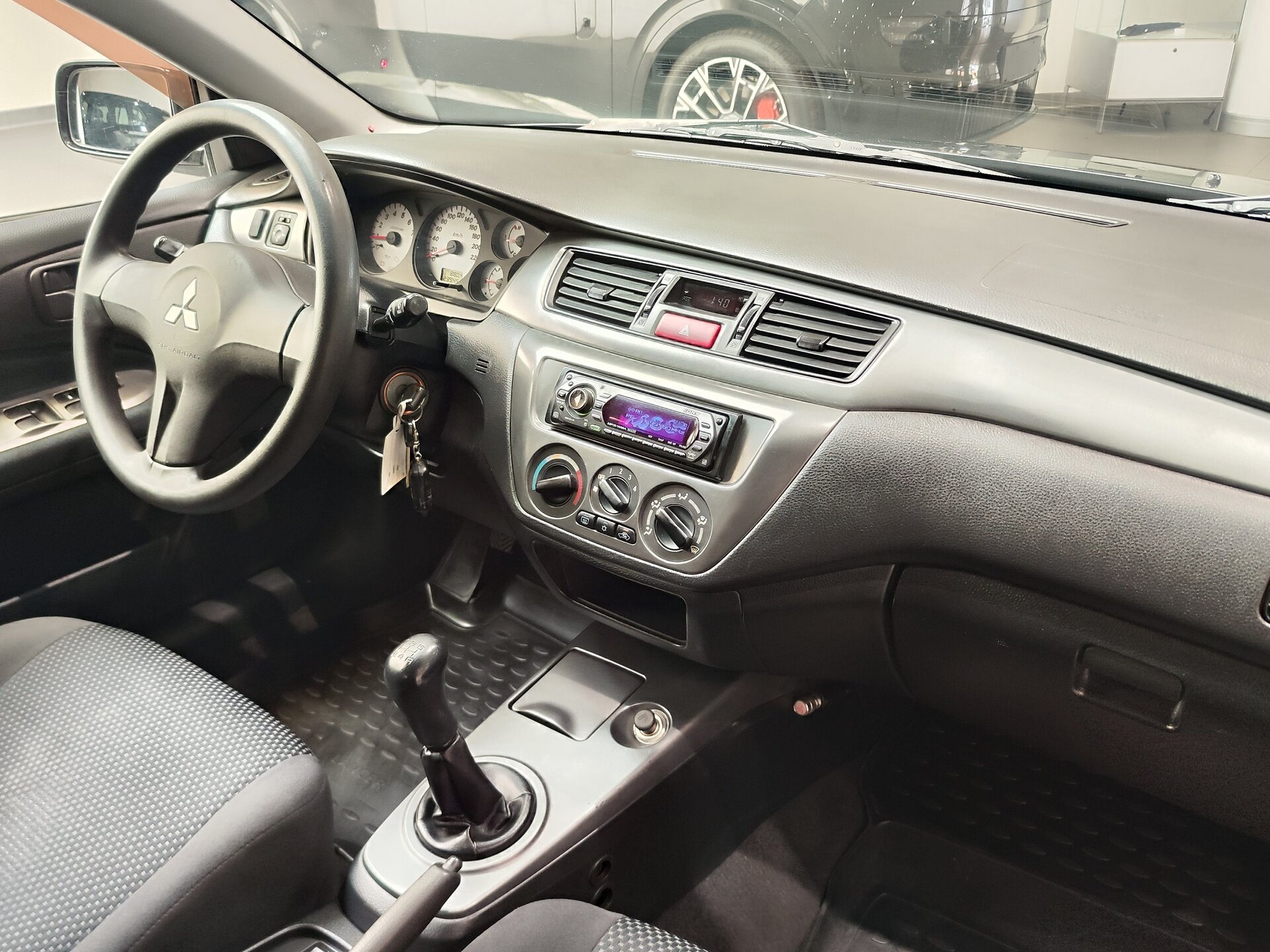 Автомобиль Mitsubishi Lancer 1.6 MT (98 л.с.) - 12