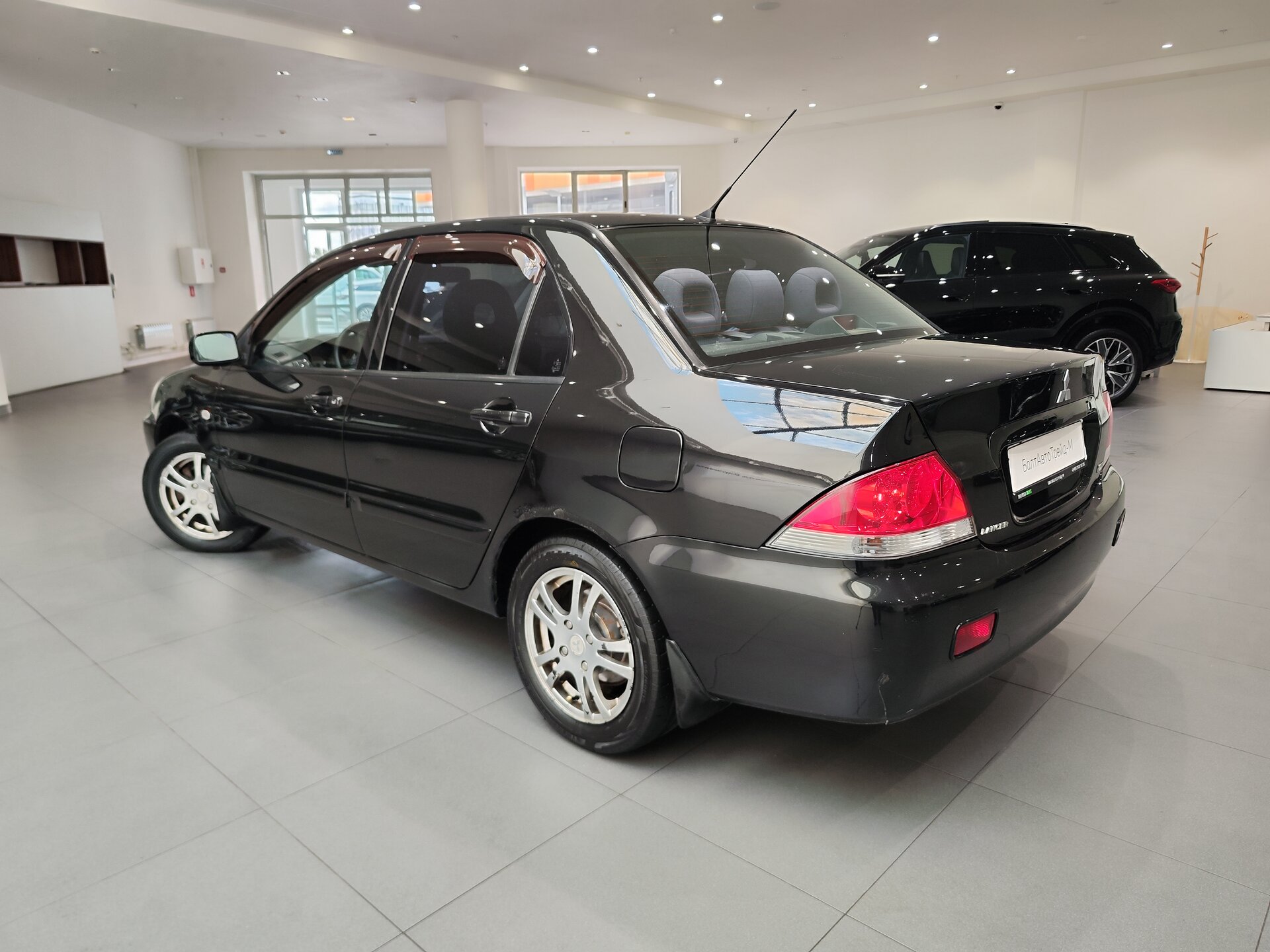 Автомобиль Mitsubishi Lancer 1.6 MT (98 л.с.) - 4