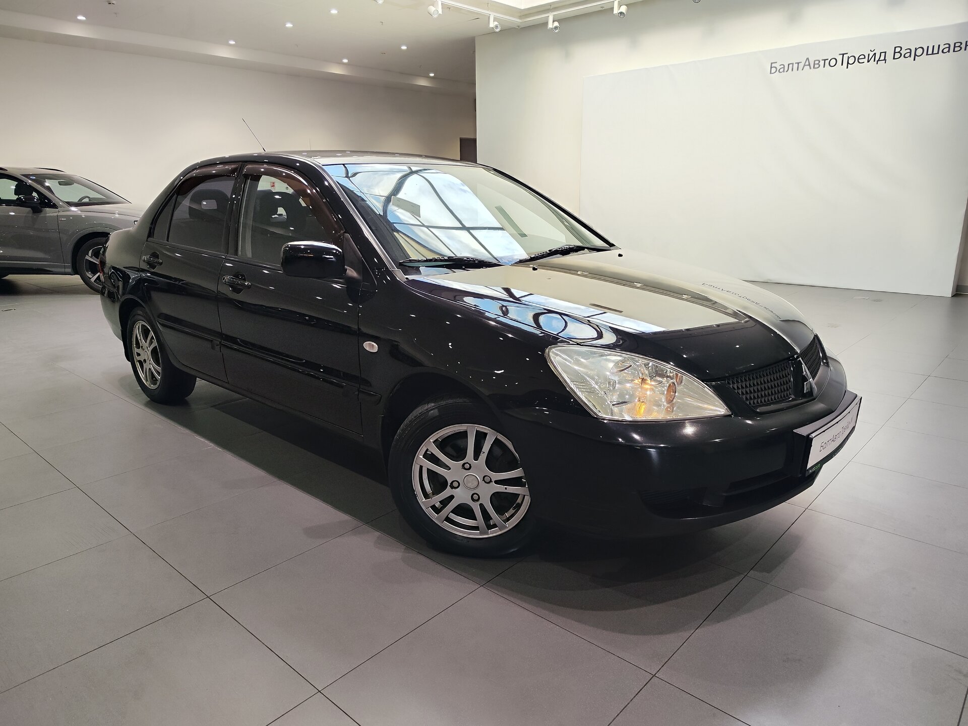 Автомобиль Mitsubishi Lancer 1.6 MT (98 л.с.) - 3
