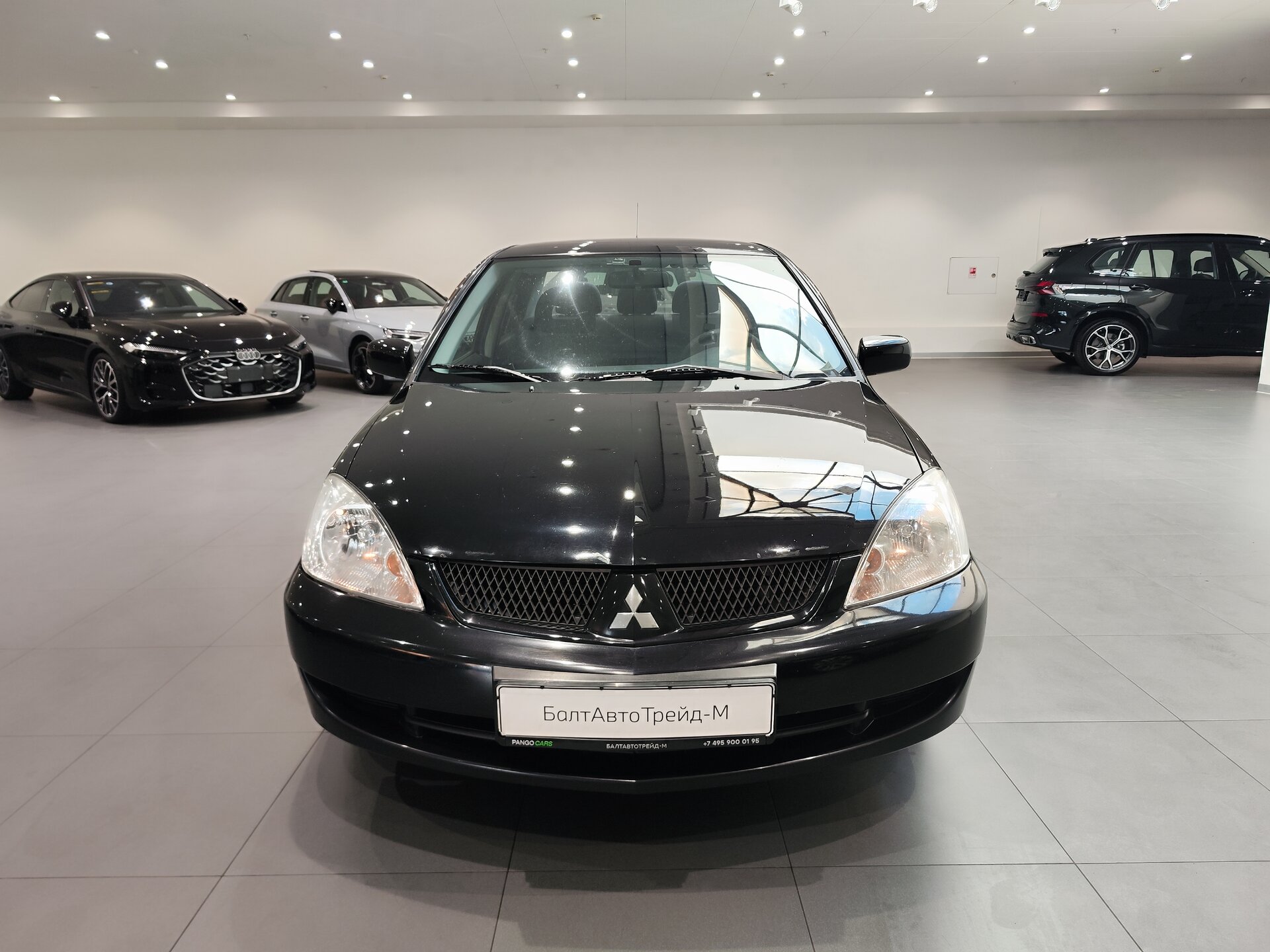 Автомобиль Mitsubishi Lancer 1.6 MT (98 л.с.) - 2