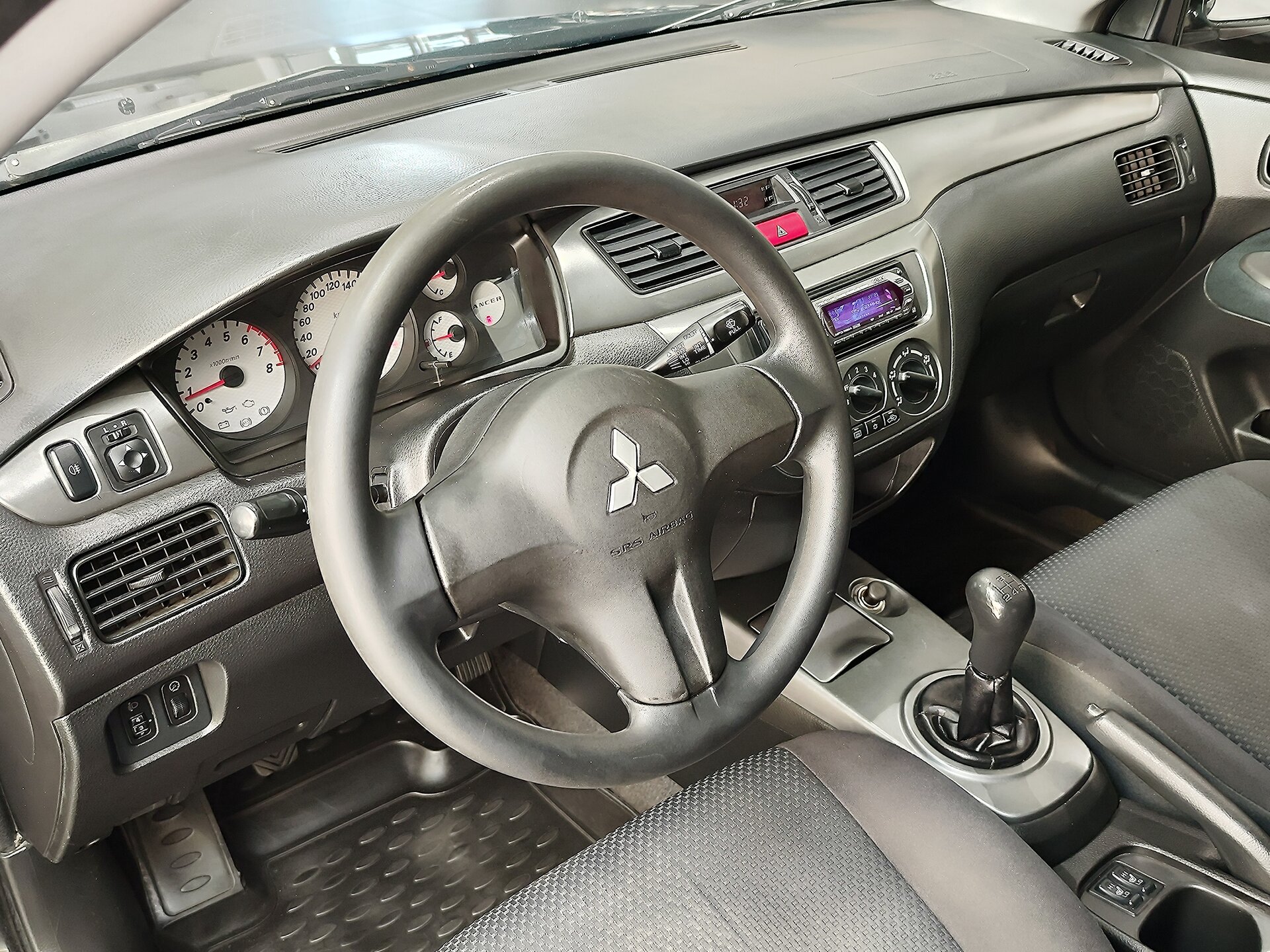Автомобиль Mitsubishi Lancer 1.6 MT (98 л.с.) - 7