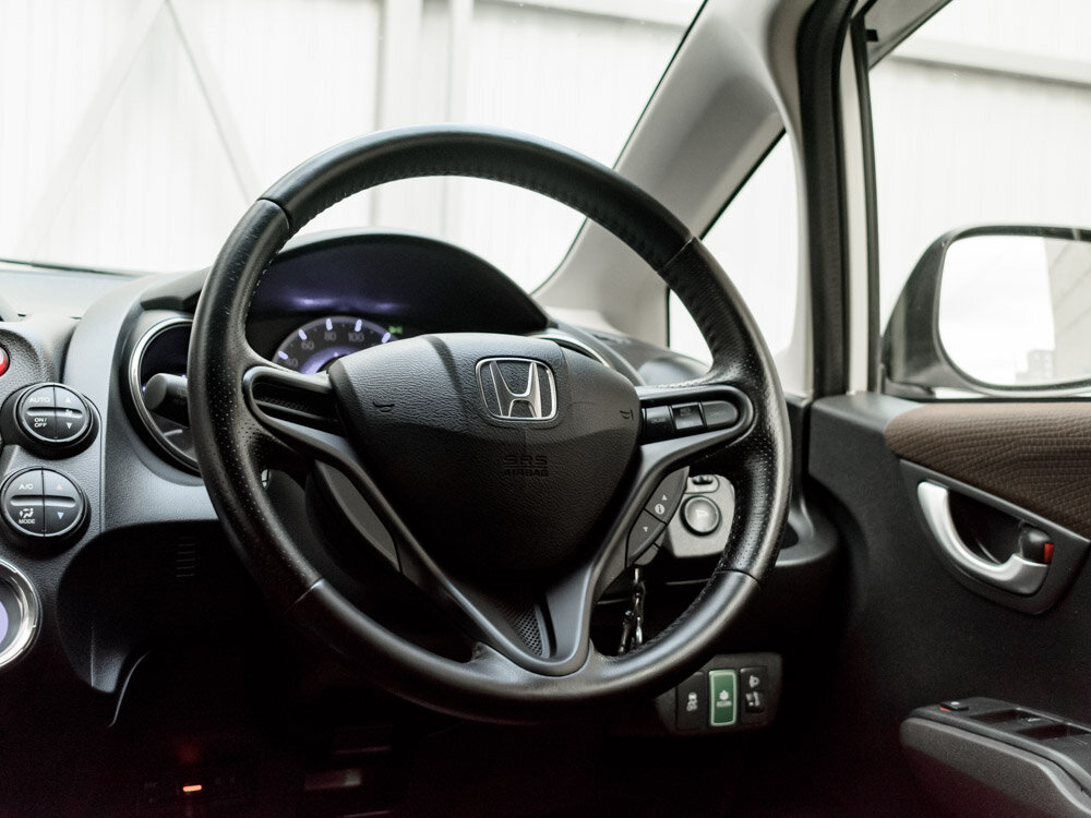 Купить Honda Fit Shuttle 1.3hyb CVT (88 л.с.), 2013 в Екатеренбурге