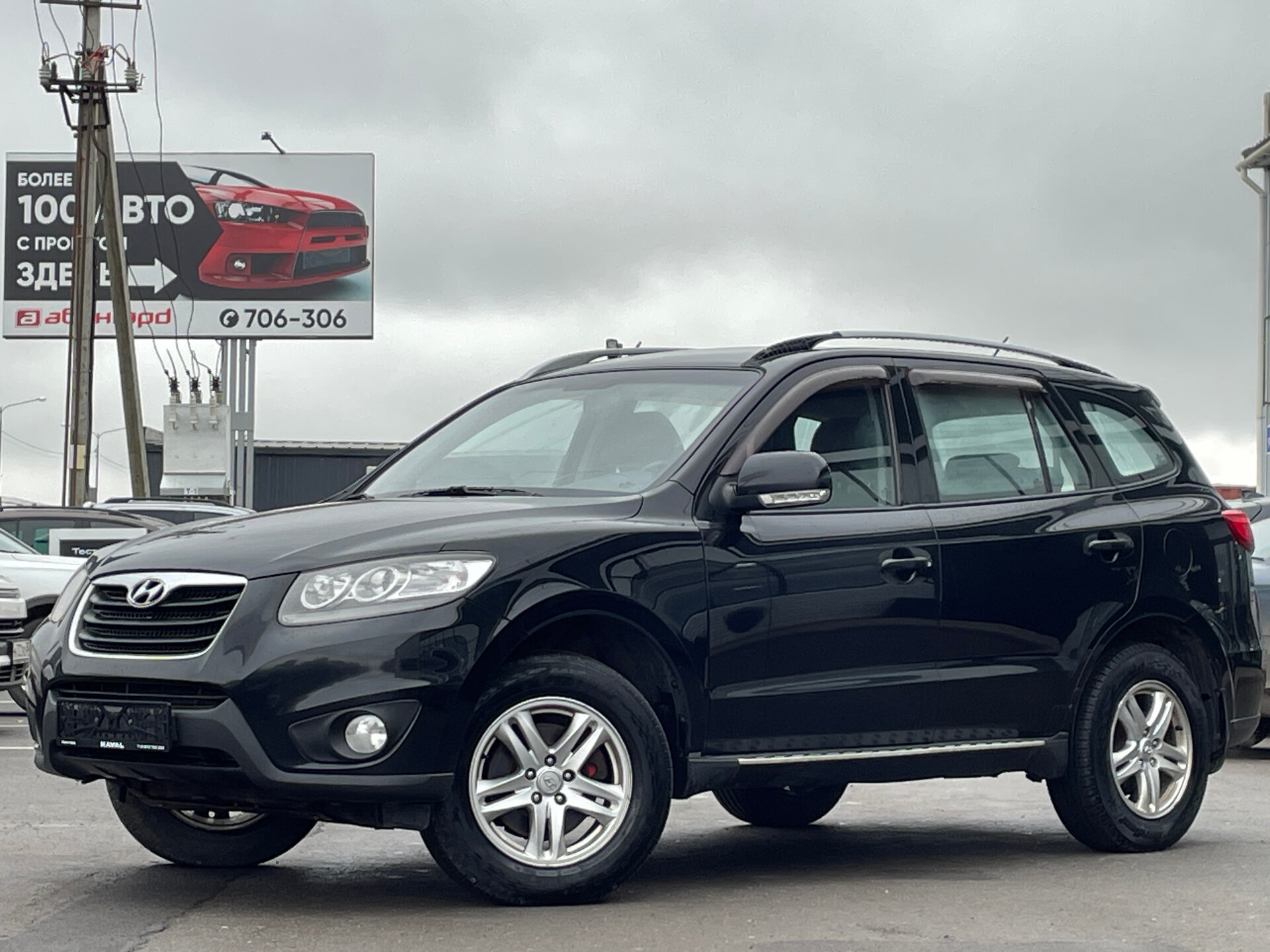 Hyundai Santa Fe, II Рестайлинг 2.4 AT (174 л.с.) 4WD 2011
