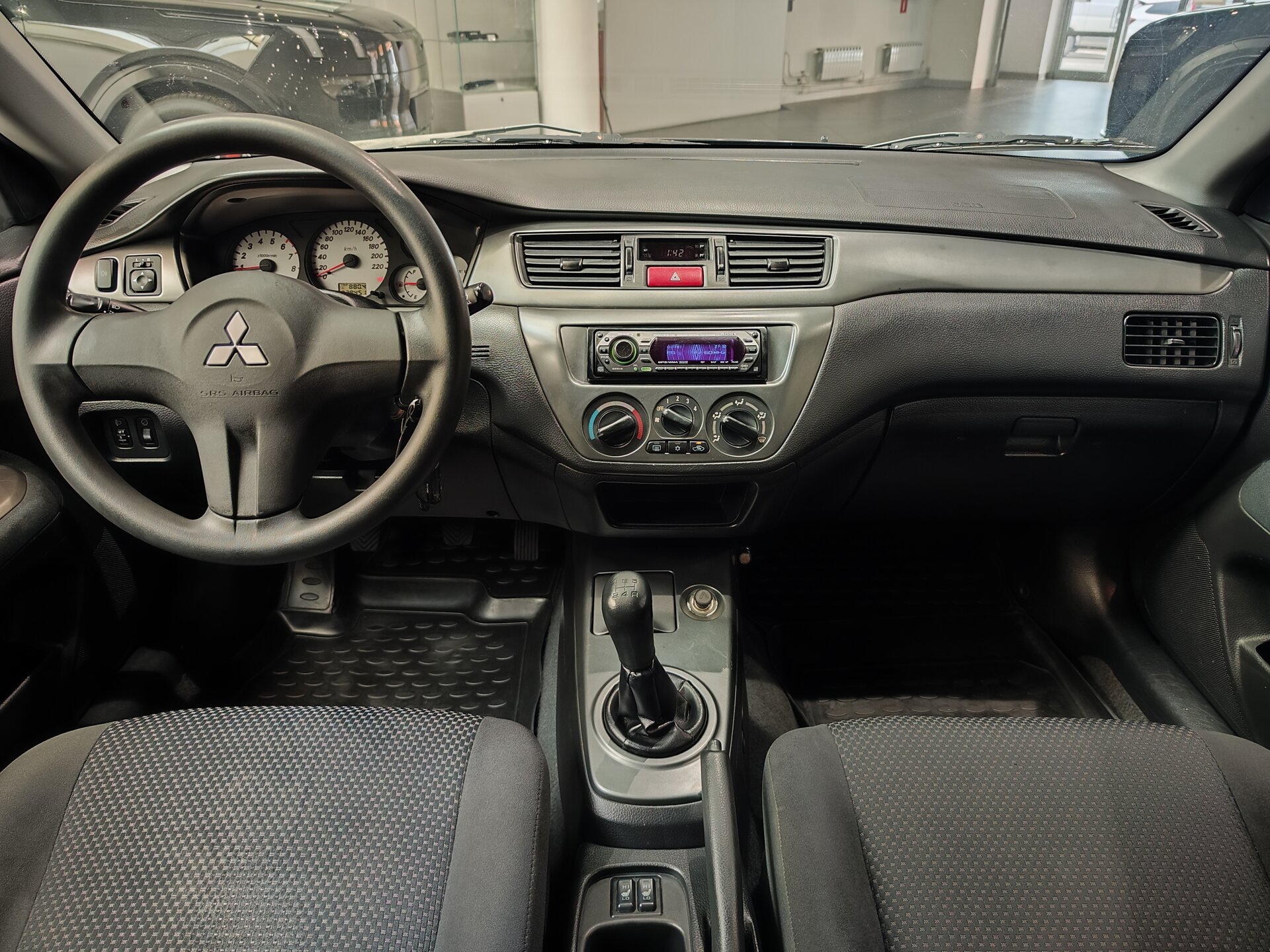 Автомобиль Mitsubishi Lancer 1.6 MT (98 л.с.) - 14