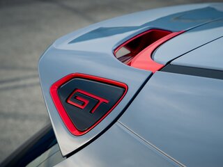 Шильдик GT на спойлере