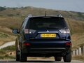 2010 Mitsubishi Outlander II Рестайлинг, чёрный, 1400000 рублей - вид 3