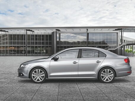 2011 Volkswagen Jetta VI, коричневый - вид 1