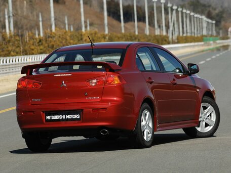 2007 Mitsubishi Lancer X, чёрный, 750000 рублей - вид 3