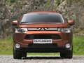 2013 Mitsubishi Outlander PHEV III, серый, 1700000 рублей - вид 3