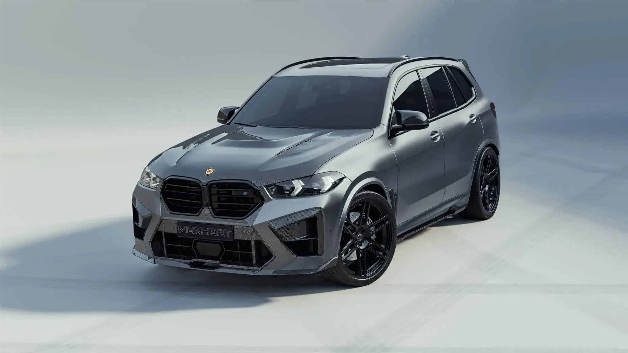 Manhart добавила большим кроссоверам BMW карбоновый обвес и почти 200 сил