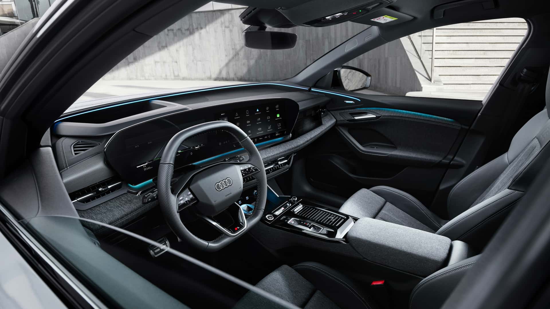 Рассекречен интерьер Audi Q6 e-tron: много экранов и «умная» медиасистема