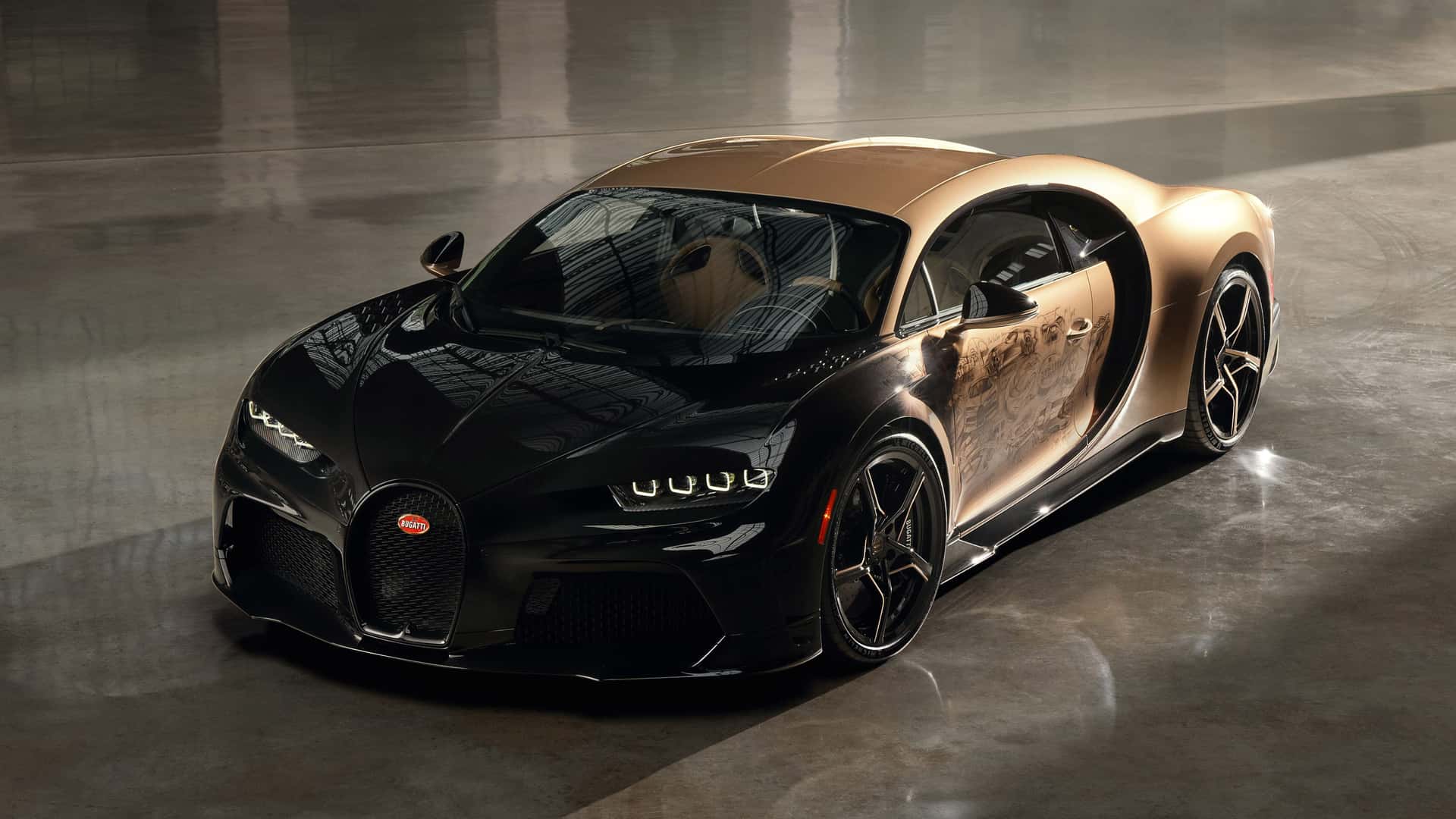 Bugatti вручную украсила кузов Chiron 45 эскизами машин разных лет. Это заняло 2 года