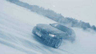 Гонщики Red Bull поездили в заносе на засекреченных электроседанах BMW i5