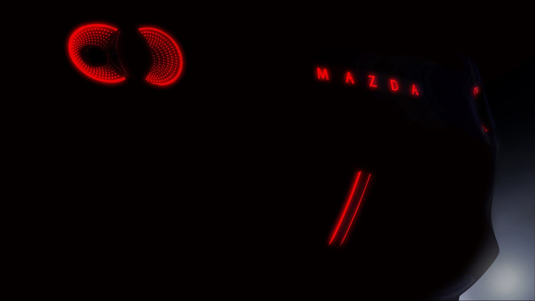 Mazda показала на тизере таинственный концепт: возможно, это преемник MX-5
