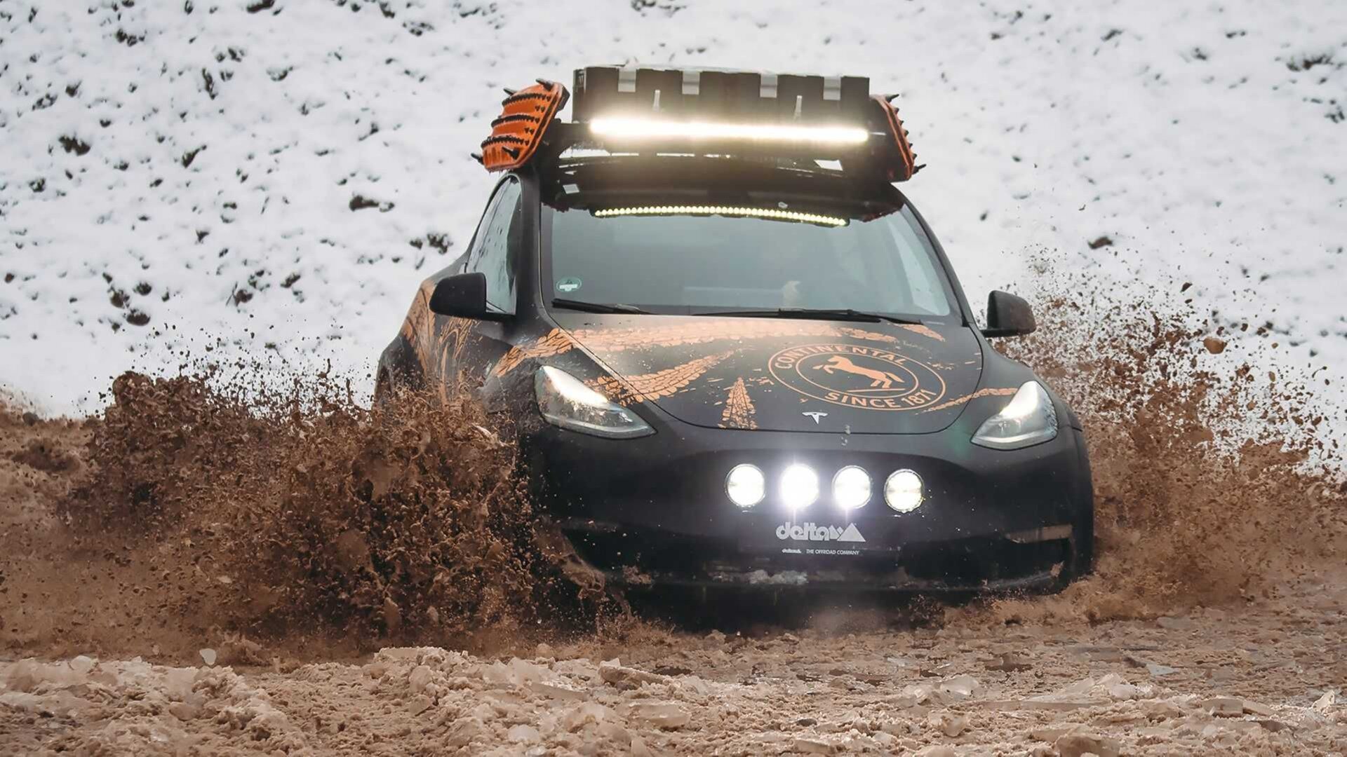 Электрокроссовер Tesla Model Y переделали во внедорожник c 220-миллиметровым клиренсом