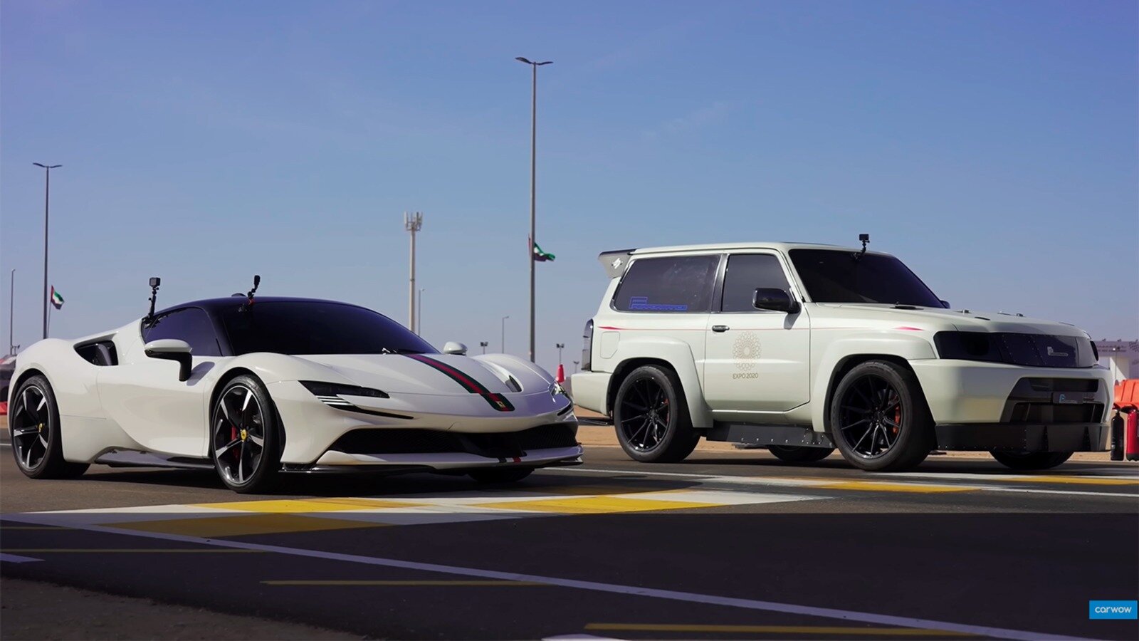 3000-сильный Nissan Patrol выставили в дрэге против супергибрида Ferrari SF90